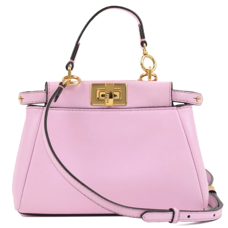 Fendi handbags with a glow - in - the - dark FF logo for a fun and unique featureFENDI Leather Micro Peekaboo 2Way Bag Hand Bag Pink 8M0355