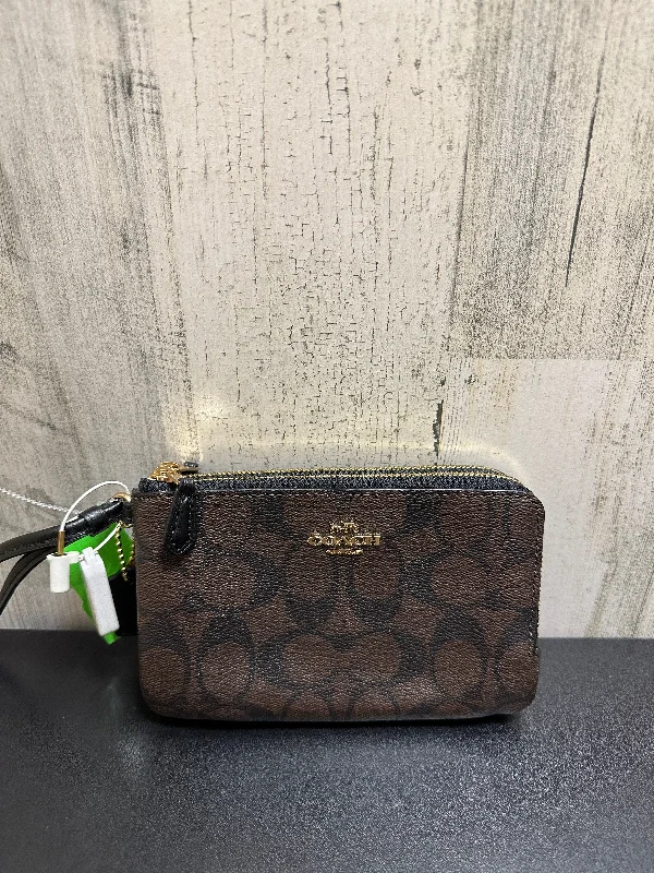 Coach crossbody bags with a printed floral pattern for a feminine touchWallet Designer By Coach  Size: Medium