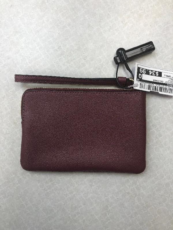 Coach Borough bags with a contrast - stitched handle for a unique lookWristlet Designer By Coach  Size: Small