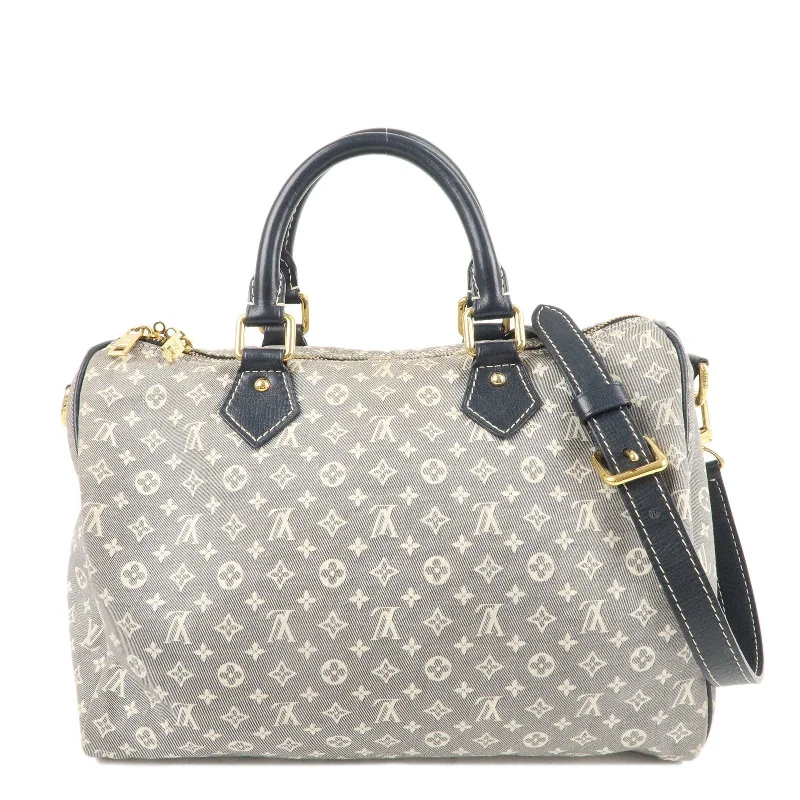 Louis Vuitton Alma bags featuring the signature top - handle designLouis Vuitton Monogram Idylle Speedy Bandouliere 30 M56703