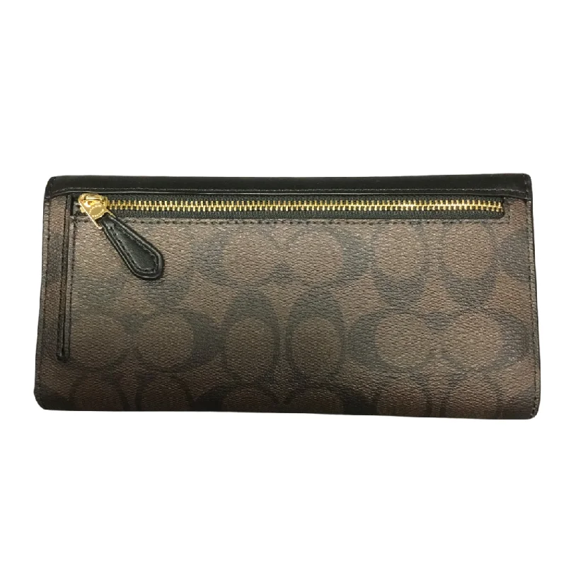 Ladies Coach Tabby bags with a detachable shoulder strapWallet Designer By Coach  Size: Medium