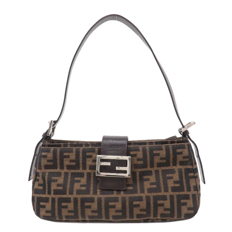 Fendi Baguette bags featuring the iconic FF logo plaque for a branded lookFENDI Zucca Canvas Leather Shoulder Bag Black Brown 26722