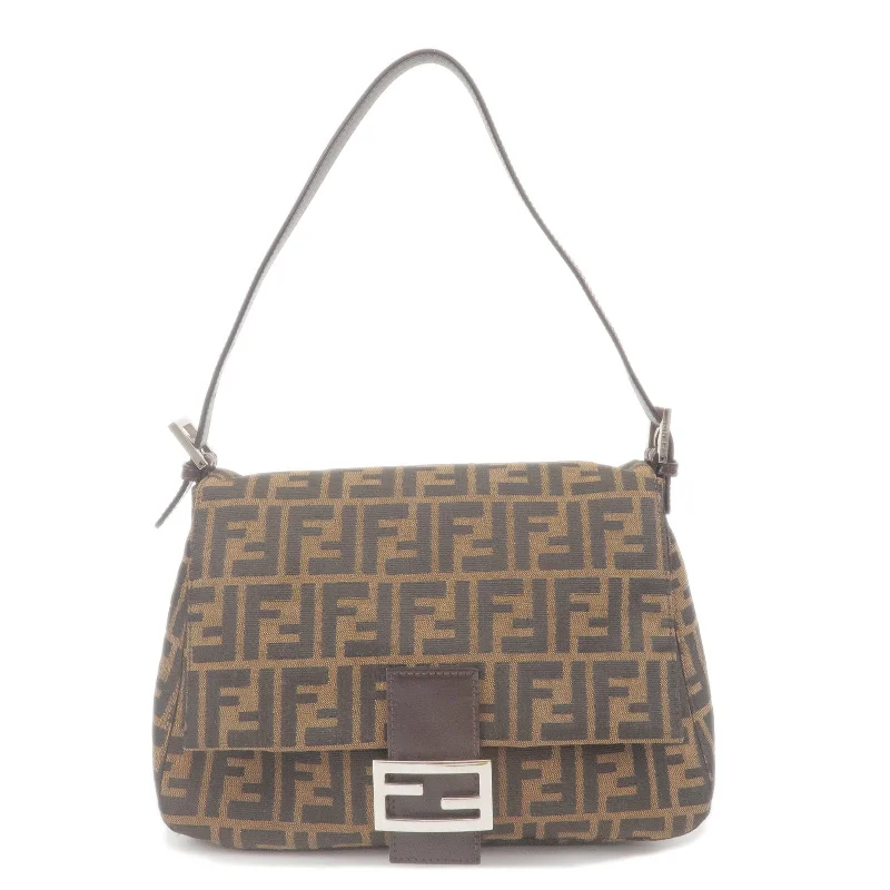 Ladies Fendi Peekaboo bags with a detachable shoulder strap for different carrying optionsFENDI Zucca Canvas Leather Mamma Baguette Bag Brown 26325