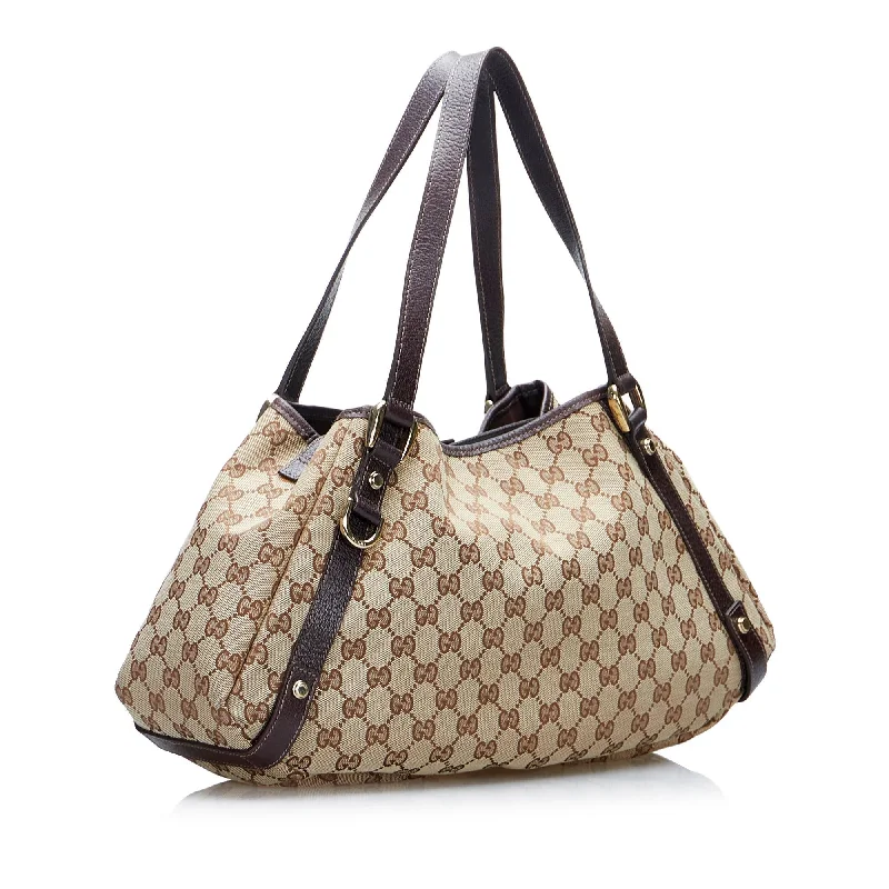 Women Gucci bags with a chain - link trim and a leather bodyWomen Gucci bags with a chain - link trim and a leather bodyGucci GG Canvas Abbey D-Ring Shoulder Bag (1FtxtO)