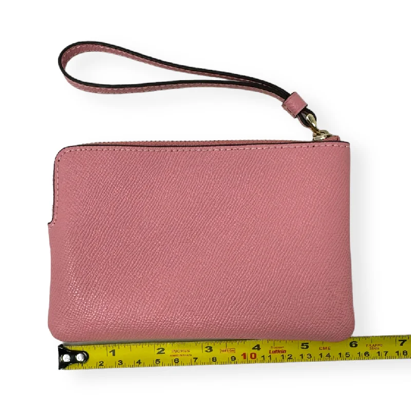 Small - sized Coach crossbody bags in smooth pebble leather for a compact carryWristlet Designer By Coach  Size: Medium