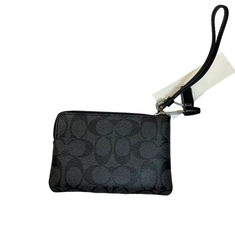 Coach bags with a zip - top closure and a front - pocket for quick accessWristlet Designer By Coach  Size: Small