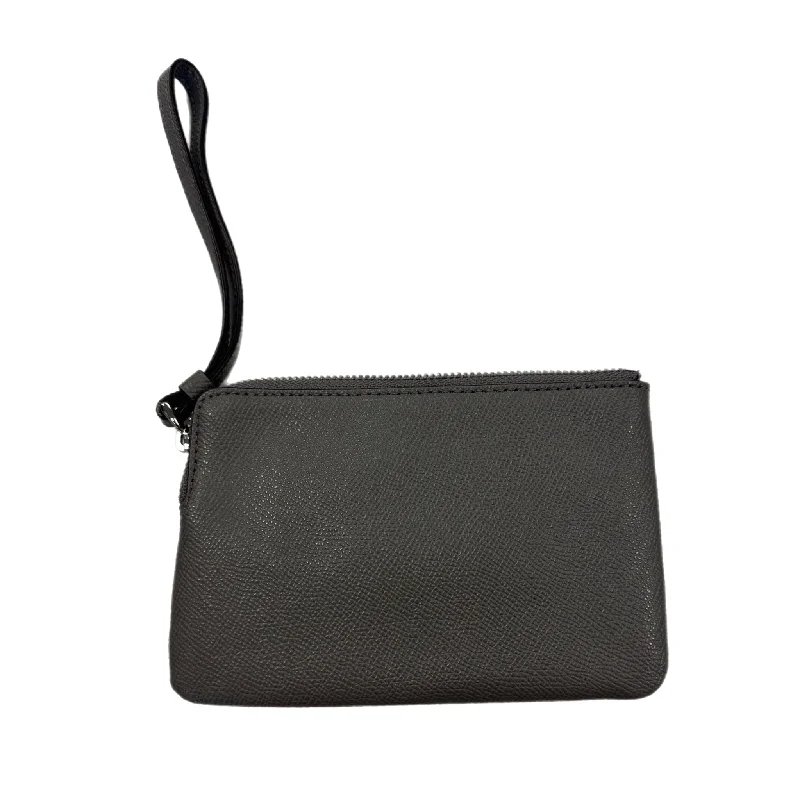 Ladies Coach handbags with a detachable wallet insert for added convenienceWristlet Designer By Coach  Size: Small