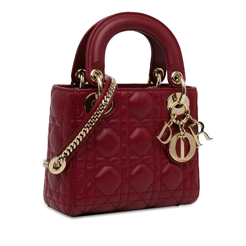 Christian Dior handbags with a snap - button closure and a decorative buckleDior Mini Lambskin Cannage Lady Dior (xICbLi)