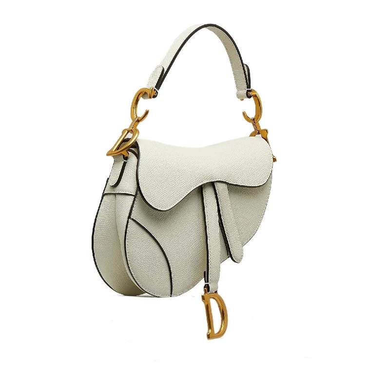 Christian Dior backpacks with a sleek, minimalist silhouetteDior Mini Leather Saddle (HvXpd6)