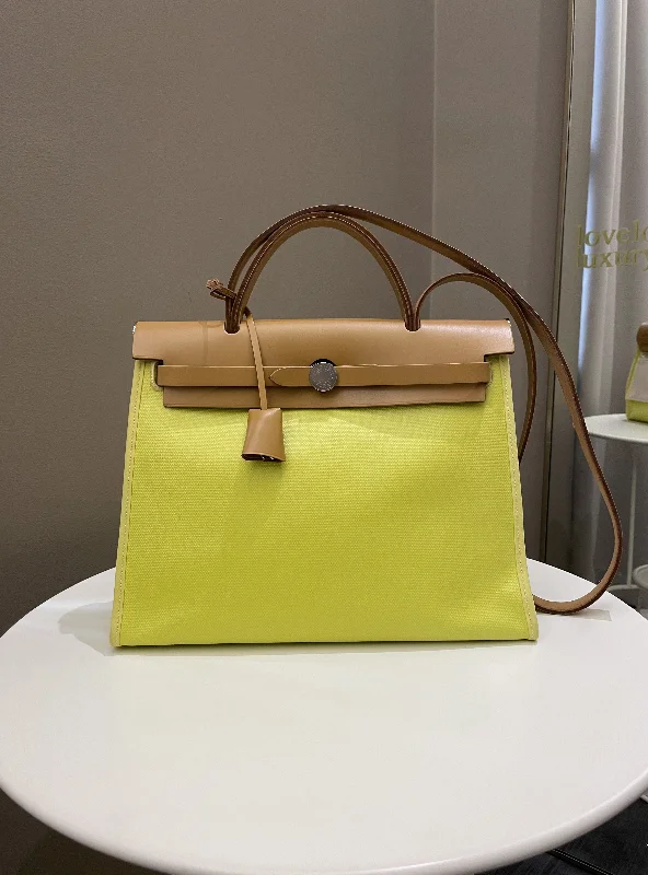 Oversized Hermes Bags for a Fashion - Forward and Practical StatementHermes Herbag Zip 31 Lime coated canvas